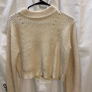 Pac Sun- Kendall and Kylie cream sweater w small hole design. Size medium.